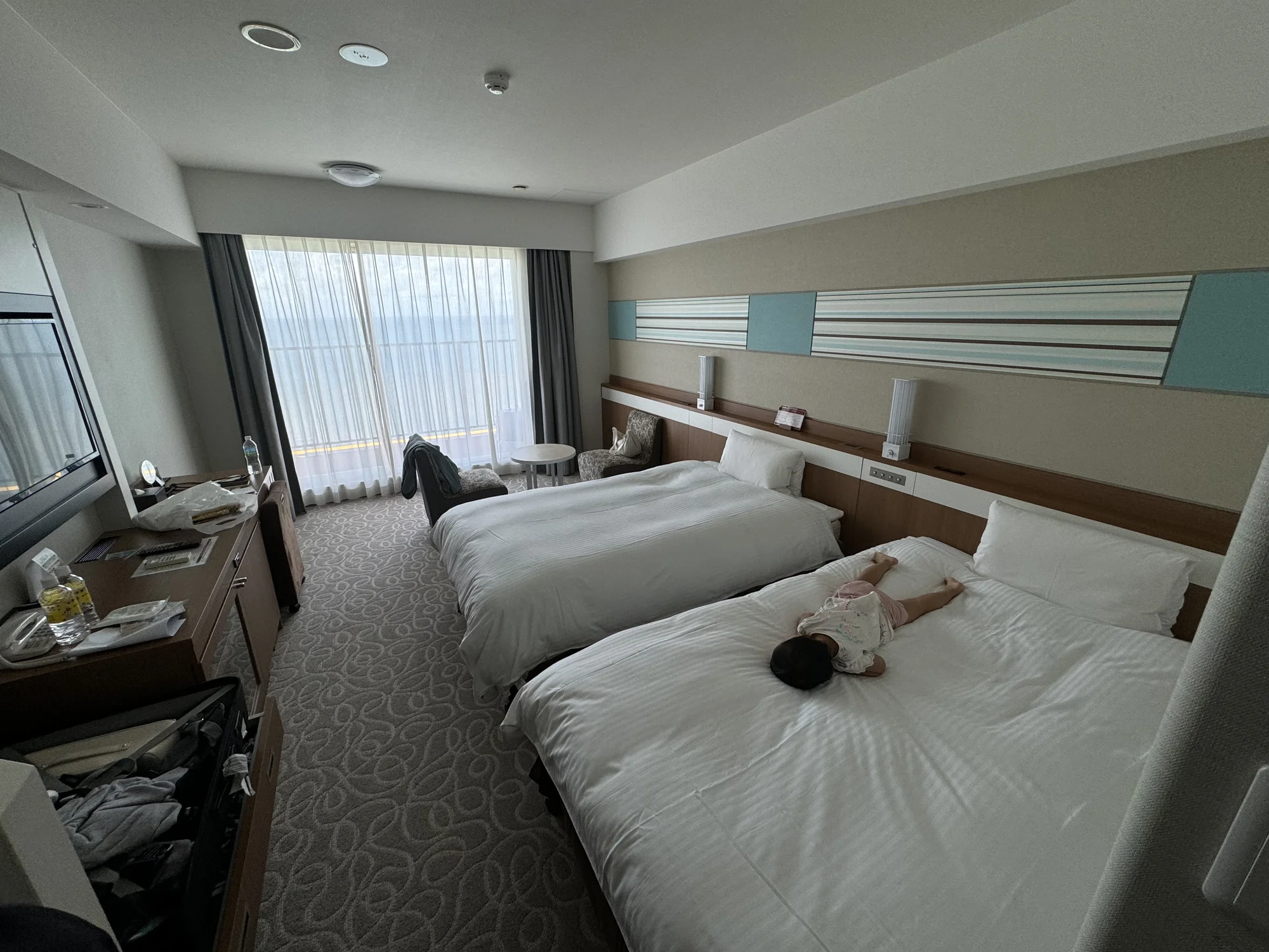 She fell asleep before we even got into the room, so we just laid her on the bed