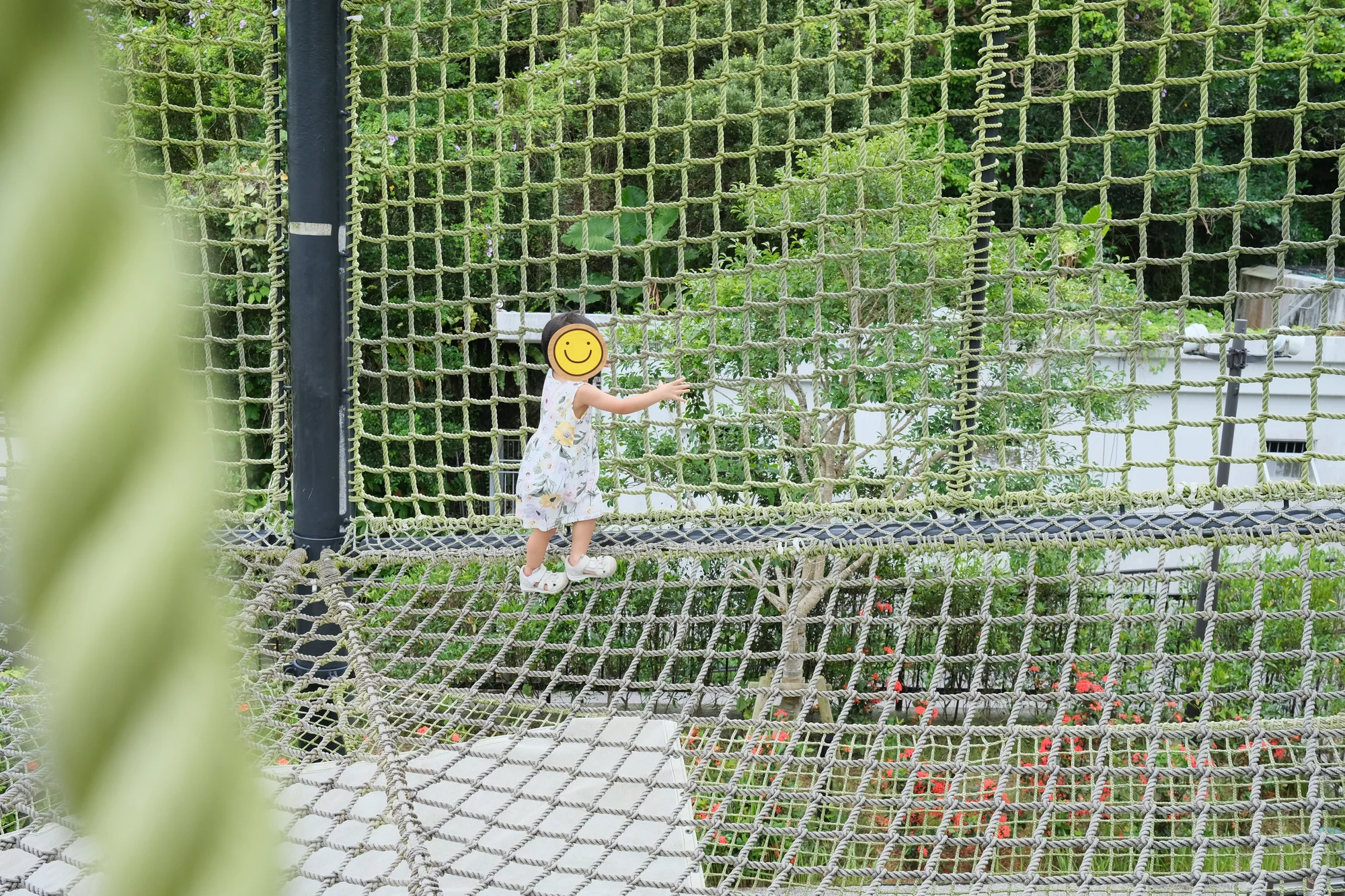 Climbing through the rope structure